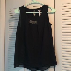 Black sleeveless blouse